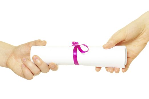 Diploma with a red ribbon in hand isolated on white 