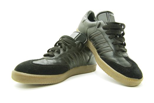 A pair of men's running shoes on white