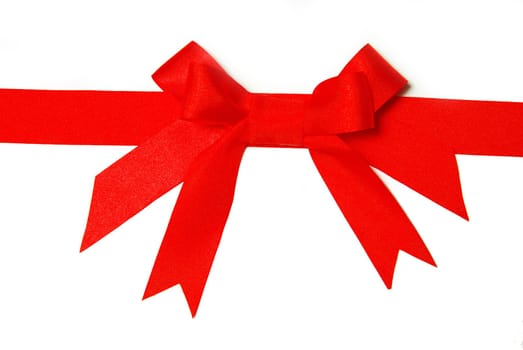 red holiday bow on white background