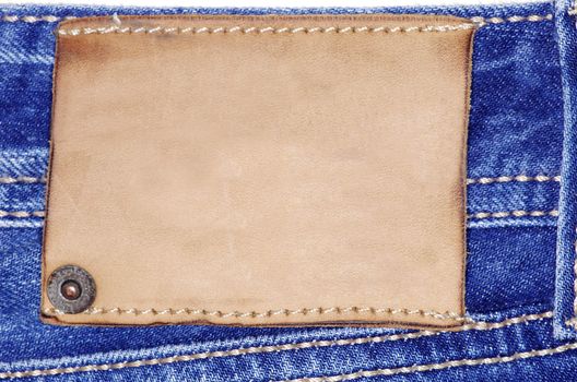 Highly detailed closeup of blank grungy leather label