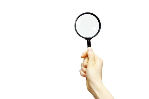 hand holding a magnifying glass on white