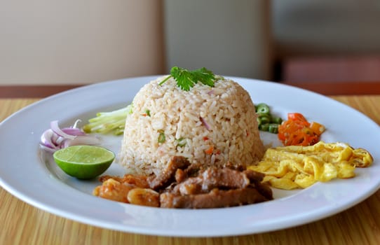 Mixed cooked rice with shrimp paste sauce and fresh vegetable, Thai cuisine