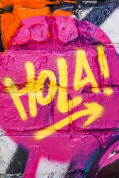 An image of a graffiti word Hola!