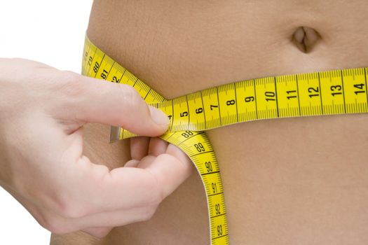 Woman measuring her waist. White background.