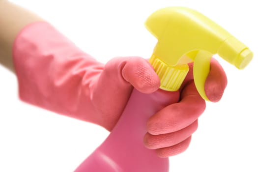 Pink gloves and a cleaning agent isolated on a white background.