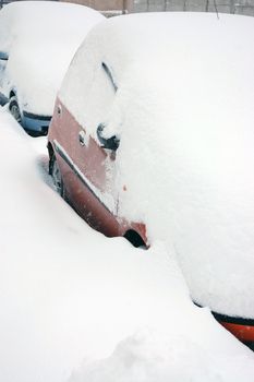 Cars on street in snow storm