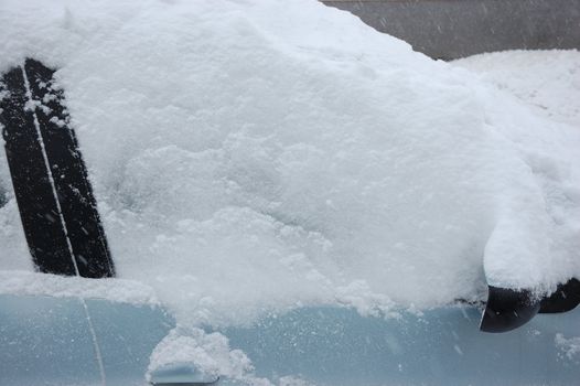 Cars on street in snow storm