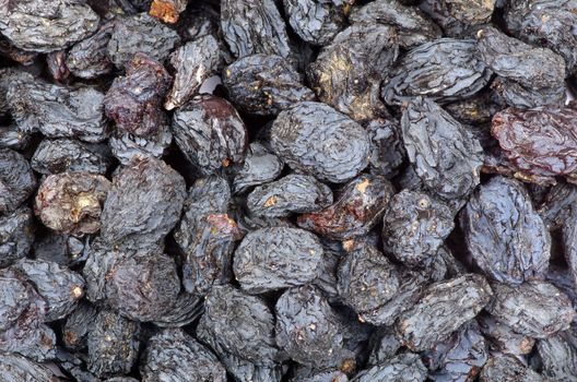a closeup of dark brown raisins