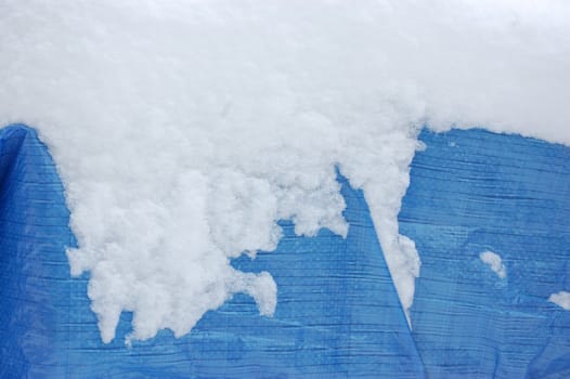 Blue garden furniture in winter