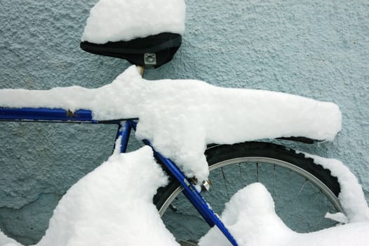 Bike covered with snow 