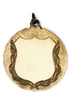 Blank gold medal isolated on a white background.