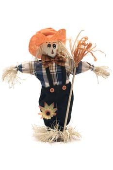 Handmade scarecrow isolated on white.