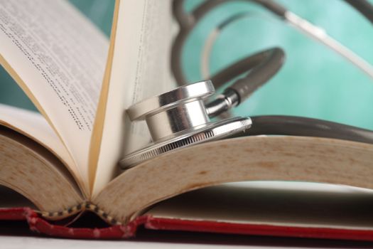 stethoscope resting on the book