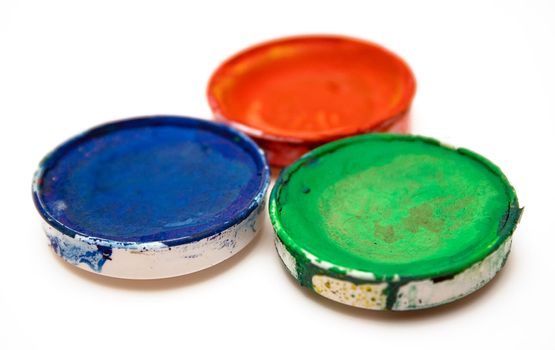 Blue, red and green watercolor isolated on a white background.