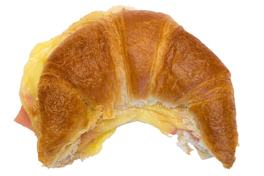 Baked croissant isolated on a white background. File contains clipping path.