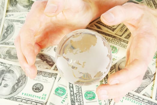 globe isolated on a dollars background