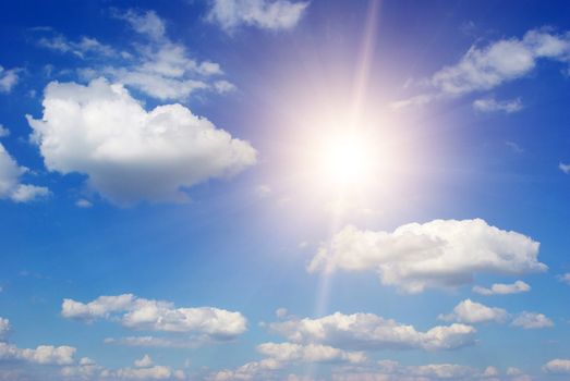 Blue sky background with tiny clouds