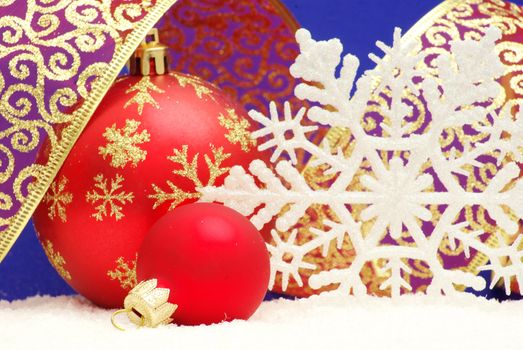 Christmas balls isolated on the blue background