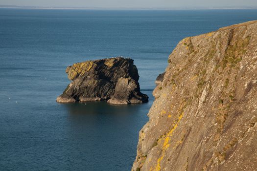 The sea stack Trwyn y Tal, on the Wales coast path at Trefor, Lleyn peninsular, Wales, UK.