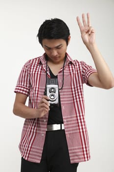 photographer holding a antique camera