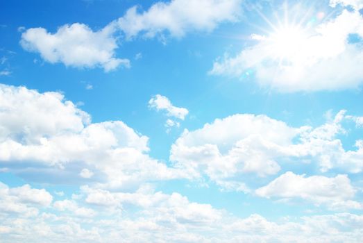 blue sky background with tiny clouds