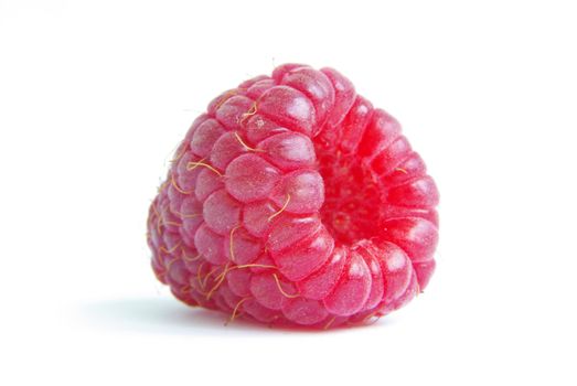 Ripe raspberry on a white background
