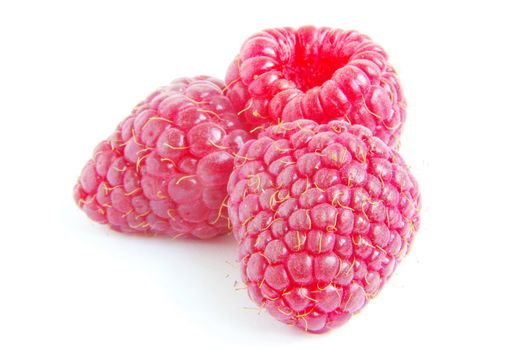 Ripe raspberry on a white background