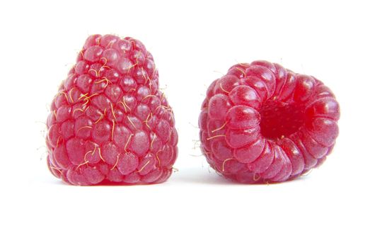 Ripe raspberry on a white background