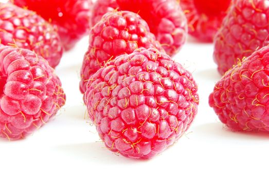 Ripe raspberry isolated on a white background