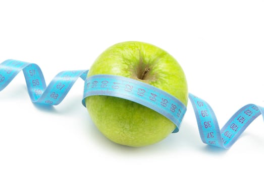  apple and measuring tape on white