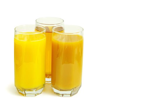 peach juice in glass isolated on white background