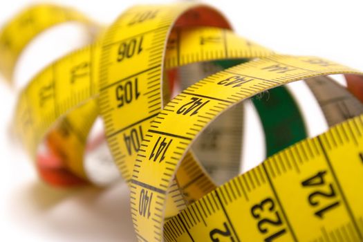 Colorful tape measure isolated on a white background.