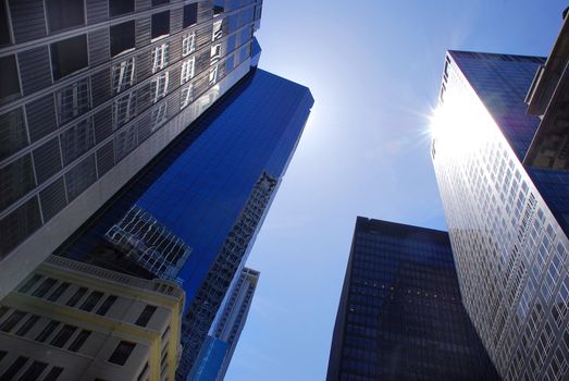 Modern office buildings in New York over blue sky