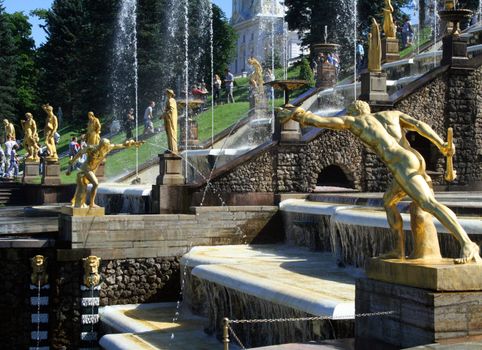 Hundreds of fountains and golden statues surround Peter's Palace- Rusias answer to Versailles.
Built between 1709 and 1724 by over 5000 soldiers and slaves was distreyed  in the 50's 
rebuilt from photographs and maps 
My other pictures of Saint Petersburg.