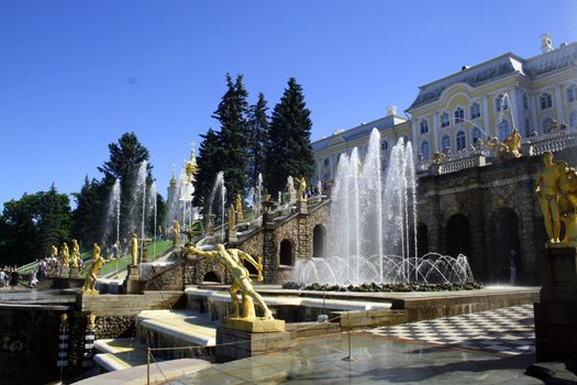 Hundreds of fountains and golden statues surround Peter's Palace- Rusias answer to Versailles.
Built between 1709 and 1724 by over 5000 soldiers and slaves was distreyed in the 50's rebuilt from 
photographs and maps 
My other pictures of Saint Petersburg.