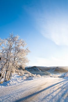 Winter on country road through beautiful valley!