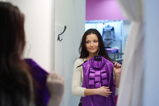 woman in dress room wear dress