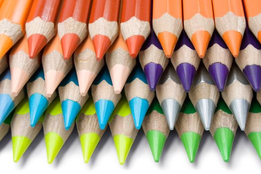 Stack of colorful pencils isolated on a white background.