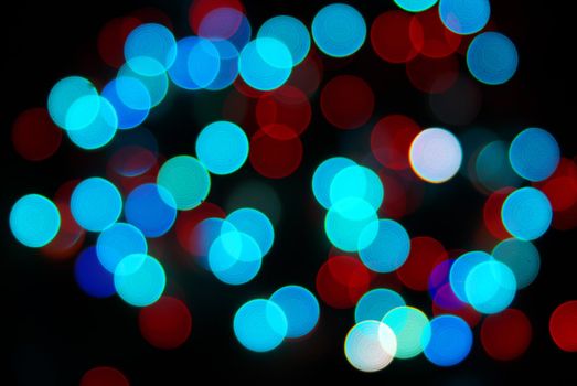 Abstract christmas lights as background on black