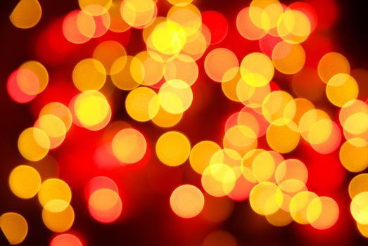 Abstract christmas lights as background on black