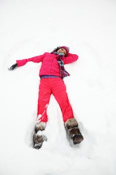 winter woman lay on snow