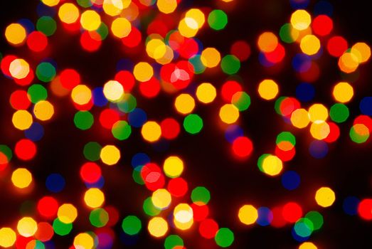 Abstract christmas lights as background on black