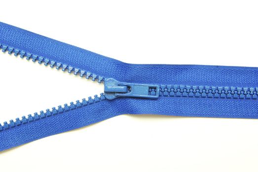 Unzipped blue metal zipper on white background
