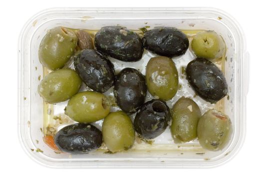 Black and green olives in a plastic bowl. Isolated on a white background.