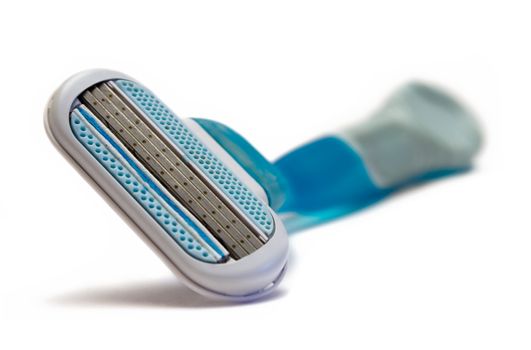 Plastic razor isolated on a white background.