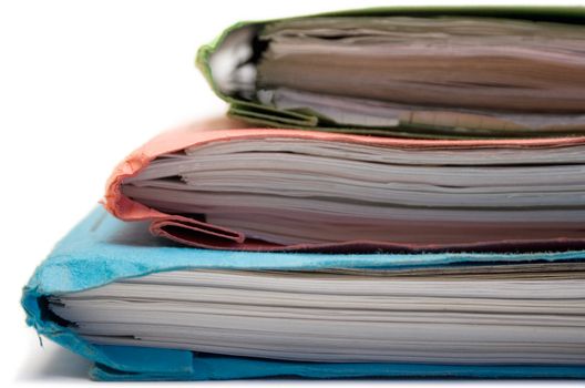 Red, green and blue folders isolated on a white background.