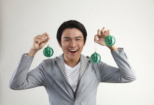 man holding Christmas Decoration on  White Background