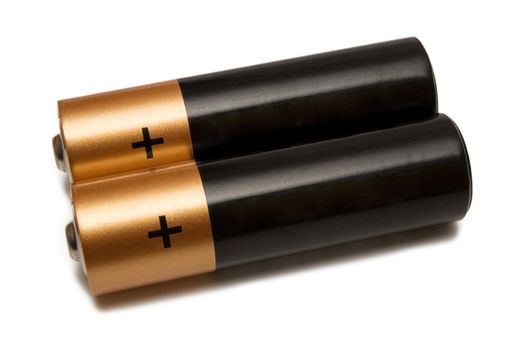 Two batteries isolated on a white background.