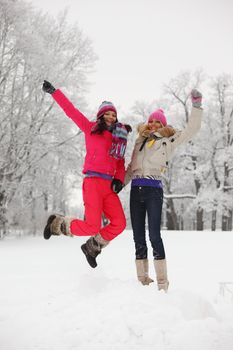 winter girl jump on snow background