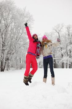 winter girl jump on snow background